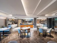 Homeinn Plus Hotel (Ulanhot Hezhan Middle School) - فطور