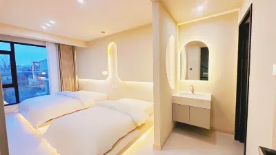 Quexishan Homestay 하이빈/해빈 공원-열대식물원 호텔