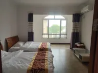 Yufeng Beach Resort B&B (Tangshan Bay Beach Store) Hotels near Moon Island