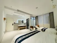 Miyou Smart Homestay (Xingyi Wanfenglin Airport South Railway Station)