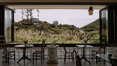 Wenling POCOaPOCO Pugu Homestay Отели рядом с достопримечательностью «Wenling Shitang Peninsula Tourist Resort»