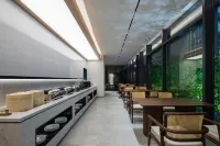 โรงแรมสโตนแอนด์แบมบู (สถานีรถไฟหนานจิงใต้) - พร้อมอาหารเช้า