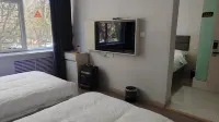 Urumqi Xuanmei Hotel - 2-نجوم