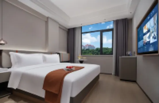 Huatian Holiday Hotel Hotels near Songbaisi