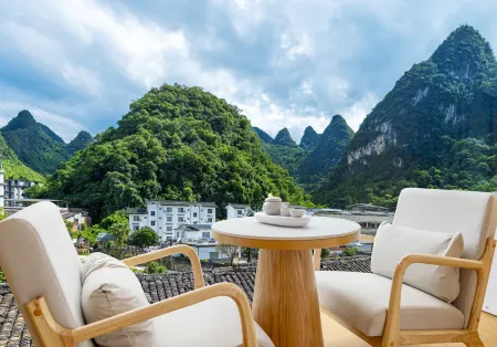 Bixi Hotel (Xingping Ancient Town Lijiang Branch) Отели рядом с достопримечательностью «Laozhai Mountain Park»