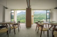 Enshi Yuejian Qingjiang Homestay - servizio colazione