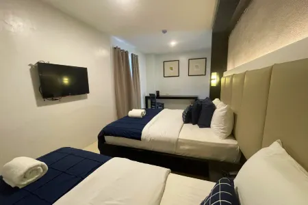 The Ranch Resort Cebu powered by Cocotel Отели рядом с достопримечательностью «Университет Висейас в Толидо Кампус»