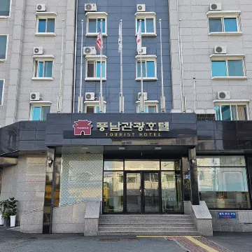 Pungnam Tourist Hotel Отели рядом с достопримечательностью «Рынок Намбу»