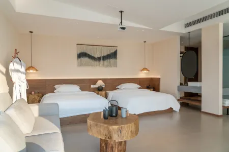 Enshi Qilihuajian Homestay Отели рядом с достопримечательностью «Hubei Enshi College»