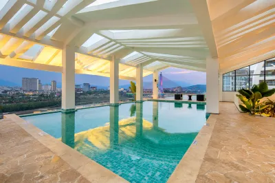 Anman Misty Wild Luxury River View Hotel (Gaozhuang Xishuangjing Star Night Market)