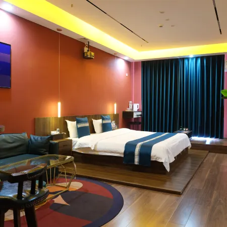 Qingpu Light Luxury Audiovisual Hotel (Longxi Gulaiwu Branch) Отели в г. Лунси