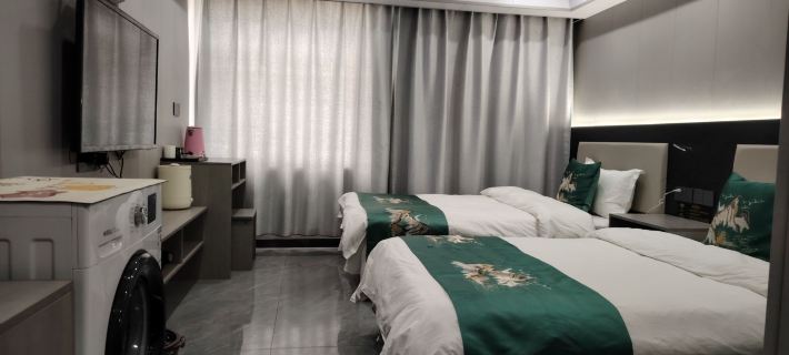 Jinxin Grand Hotel (Gangrenboqi Scenic Area) Ξενοδοχεία στην πόλη Πουλάν
