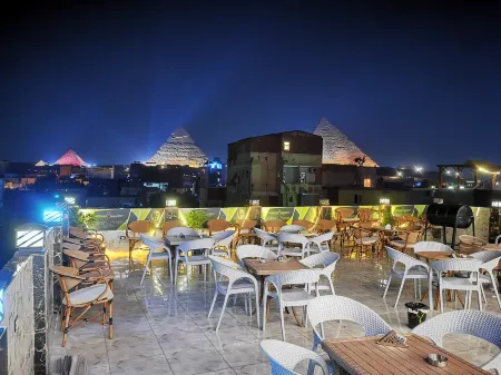 The View Pyramids Hotel Отели в г. Nazlet El-Semman