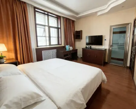 Orange Hotel New Zealand فنادق في لونغ شي