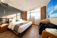 โรงแรมมู.จี ซันคิสต์อีสต์ (ถนนป้ายฝาง เมืองโบราณเฉาโจว) - พร้อมWifi