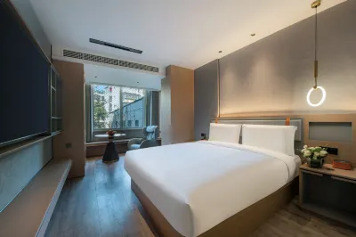 Yiwang Hotel (Shuangyu Passenger Transport Center Wenjin Road)