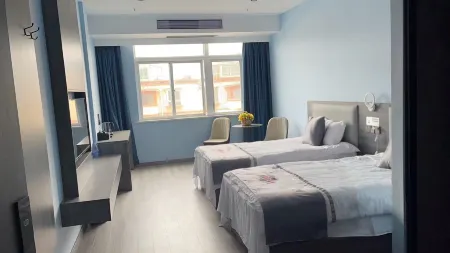 Fuyang Xinjia Business Hotel Отели в г. Цзунъян