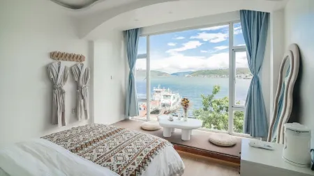 Dali Nanfeng Yiyu Seaview Hotel Santorini Отели рядом с достопримечательностью «Yuxi University of Applied Technology»
