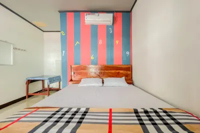Ekas Beach Guesthouse Mitra RedDoorz Hotel dekat Lorong Kehidupan