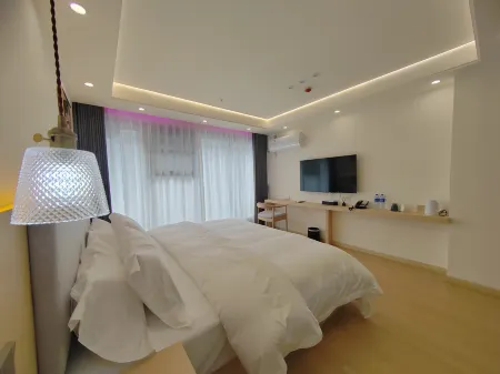 Luoqi Garden Meisu Hotel Отели рядом с достопримечательностью «Sichuan Vocational College of Science and Technology (Western District)»