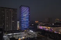 HuaJiYaShe Hotel (Huzhou Aishan Square Yishangjie) Hotel in zona Niushi Number One Scholar Hall
