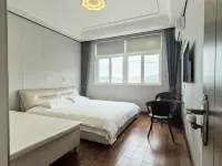 Lin Ayi's Home Hotels near Golden Beach