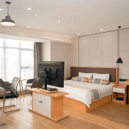 Leshang Holiday Homestay (Zhumadian Jiefang Avenue Leshan Mall)