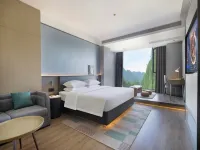 Liyi Hotel (Xishuangbanna Jinghong Mengle Grand Buddha Temple Manchester Rainforest Park Branch) Hotels in Jinghong