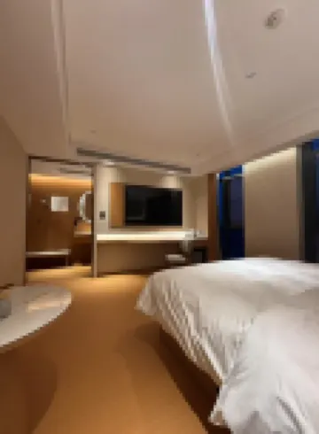 Qingdao Quanyi Hotel (Xinduxin Qingjiang Road Metro Station Branch)