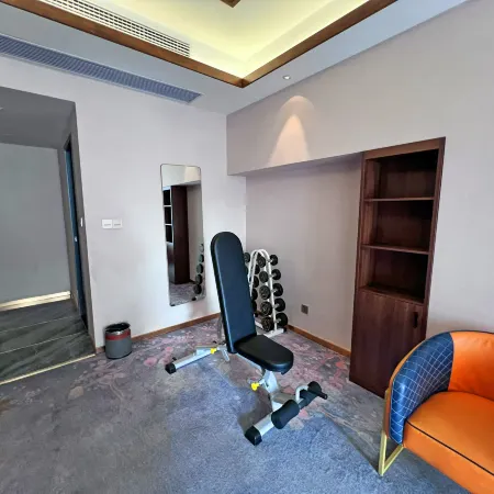 Gushi Hotel (Baolong Building 3)