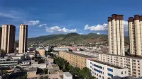 Xinghe Qixin Hotel (Minzhou Nightless City) - Dağ Manzaralı