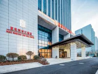 Lanhai Junhua Hotel (Qingdao Dongjiakou Branch) Отели рядом с достопримечательностью «Донг Цзяо устье»
