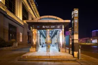 Guoshi Hotel (Dalian Donggang Business District Harbour Plaza Subway Station)