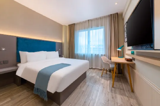 Elong Anyun Hotel (Haikou Friendship Sunshine City Haiken Square Branch) Отели рядом с достопримечательностью «Martyrs' Cemetery»