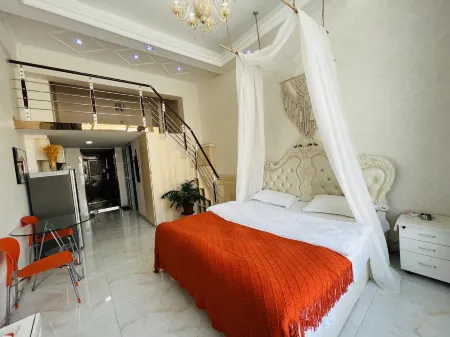 Tonghua Qingxiang LOFT Red Star Macalline Homestay Отели в г. Тунхуа