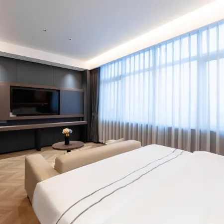 Mengdan International Hotel (Jiangmen Hetang Central Square Jinyi City Branch)