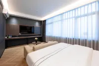 Mengdan International Hotel (Jiangmen Hetang Central Square Jinyi City Branch)