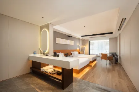 Jingdezhen Xin Baidu Hotel (China Ceramic Museum Ancient Kiln Folk Customs Expo Area Branch) Отели рядом с достопримечательностью «Moon Lake Scenic Area»