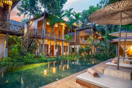 Isann Lodge Отели рядом с достопримечательностью «Лолей»