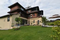 Xinrongju Homestay (Mangshi Daigu Town Branch)