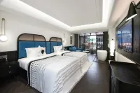 Xishuangbanna Jinghong Lanbo Designer Hotel (Guang Zhuang Star Night Market Branch)
