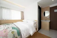 Weihai Jiaqi Hotel (Weihai high speed railway bus terminal store)