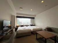 Tokyu Stay Aoyama Premier Tokyo Отели рядом с достопримечательностью «Джаз-клуб Blue Note Tokyo»