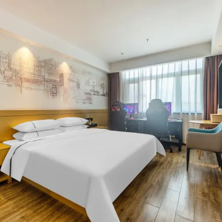 Jingyue E-sports Homestay (Suichuan County Government Pedestrian Street Wholesale City)