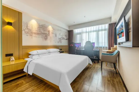 Jingyue E-Sports Hotel (Suichuan County Government Pedestrian Street Wholesale City) Отели в г. Суйчуань