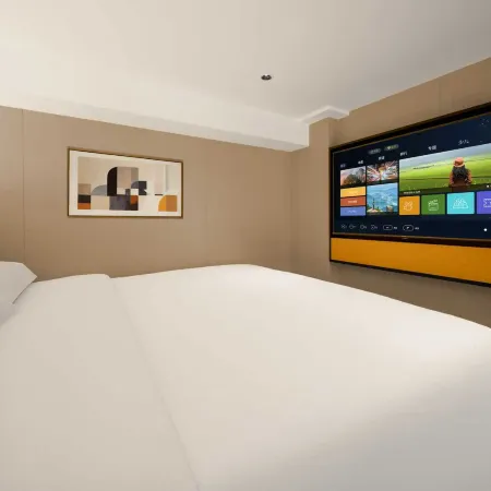 Yinchi Business Hotel (Jinxian County IM Plaza)