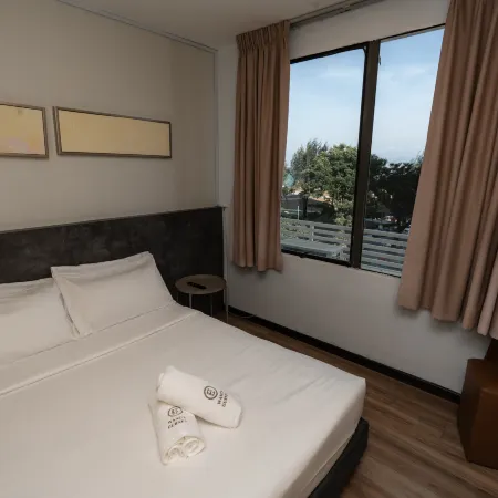 Wangs Hotel Gurney Drive Отели рядом с достопримечательностью «Набережная Герни-драйв»