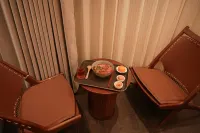 Zhaosu Shanzhichuanxingma Themed Vacation Apartment
