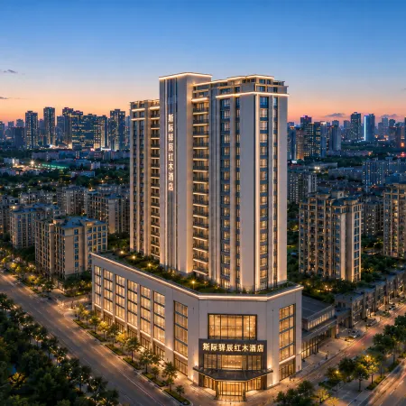 Yichen Hongmu Hotel Отели в г. Синъи