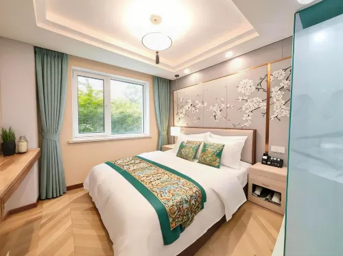 Qifeng Guli Light Luxury Homestay (Kaifeng Qingming Shanghe Garden Gulou Square Branch)
